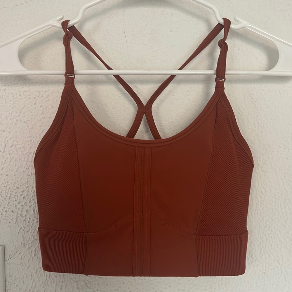 Nike workout top in rust orange, small